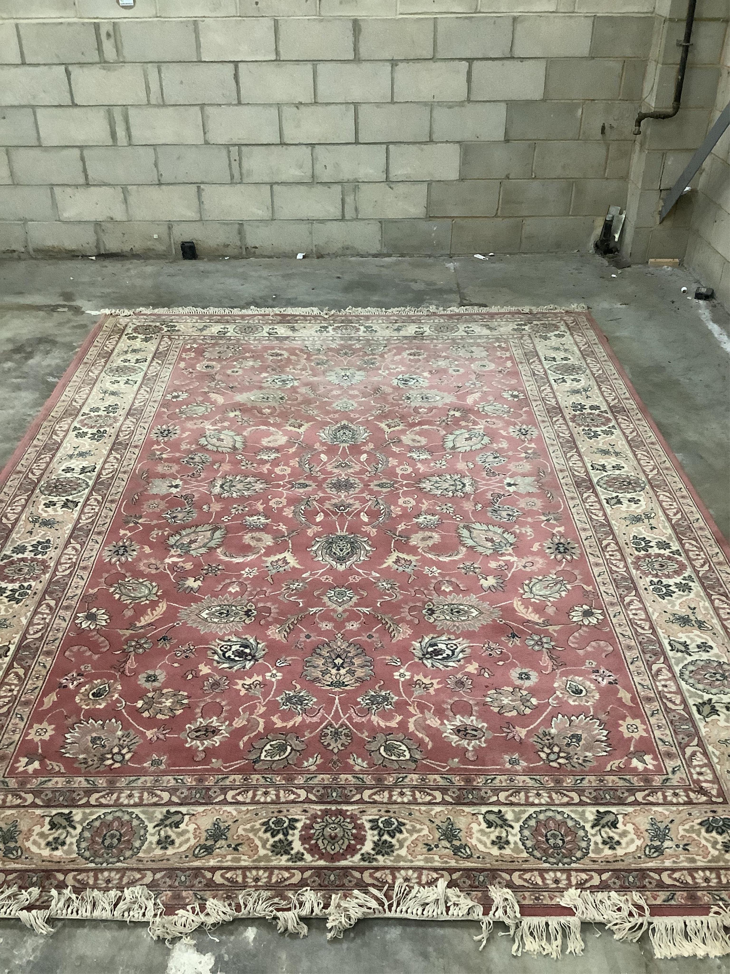 A Kashan style peach ground machined carpet, 360 x 274cm. Condition - fair to good, will require cleaning.